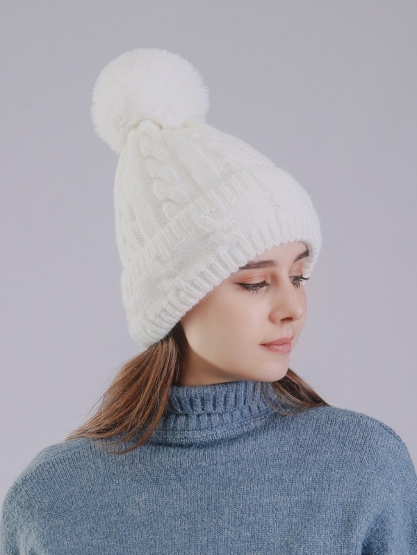 Gorro de lana con pompón de mujer