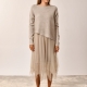 Vestido de punto con falda de capas tul irregulares beige