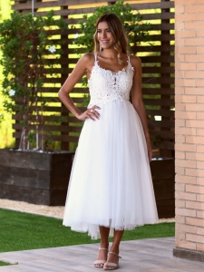 Vestido de novia corto en Meua Boutique.